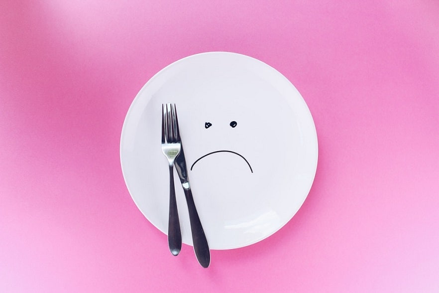 Plate with sad face (River Centre Clinic)